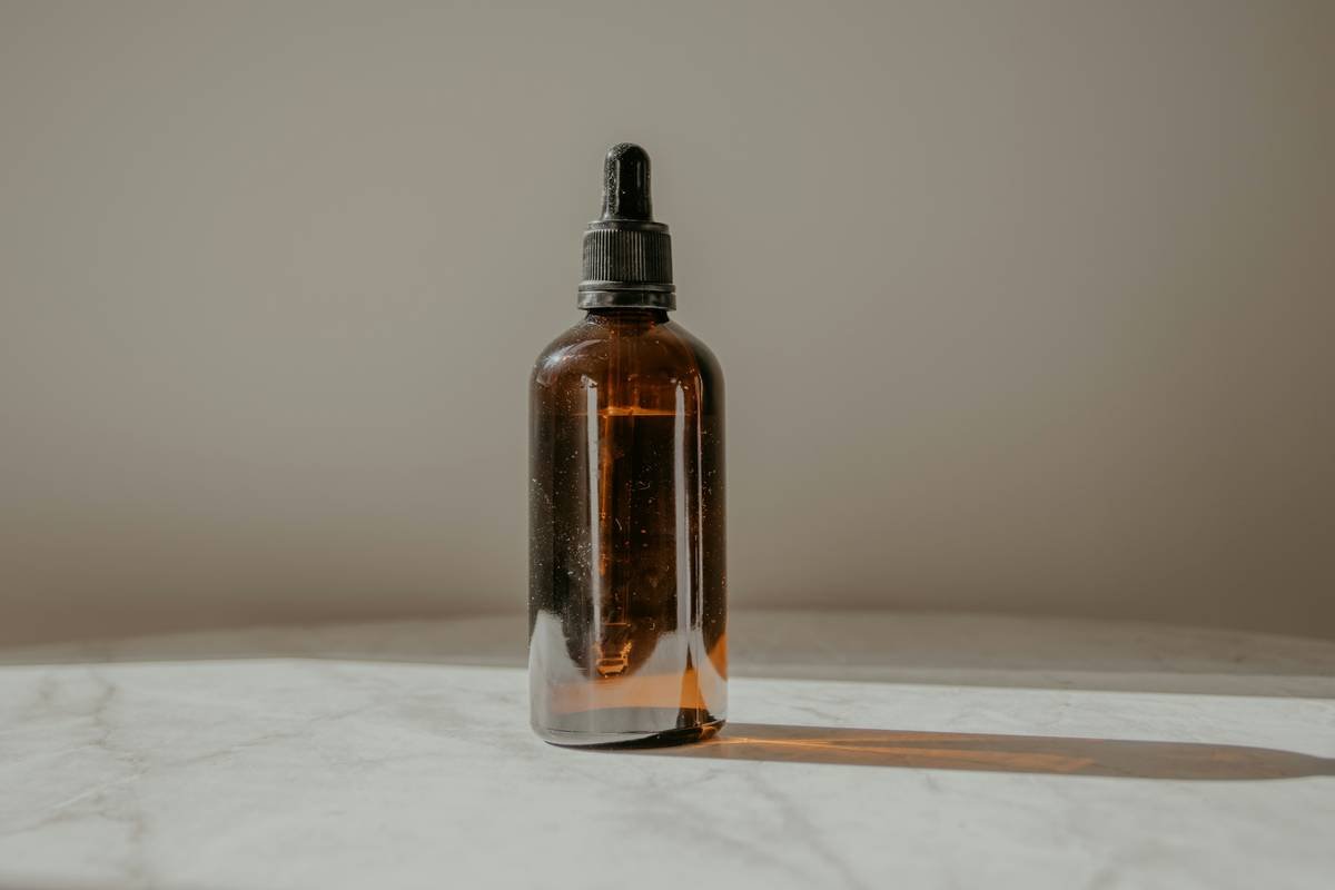 Before-and-after photos of male subject showing reduced redness and irritation after 7 days of using cooling post shave lotion