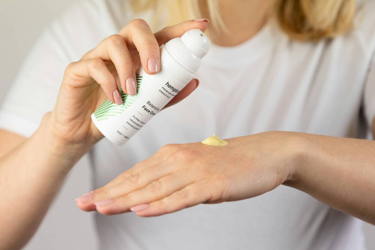 Applying soothing aftershave for irritation with clean fingertips